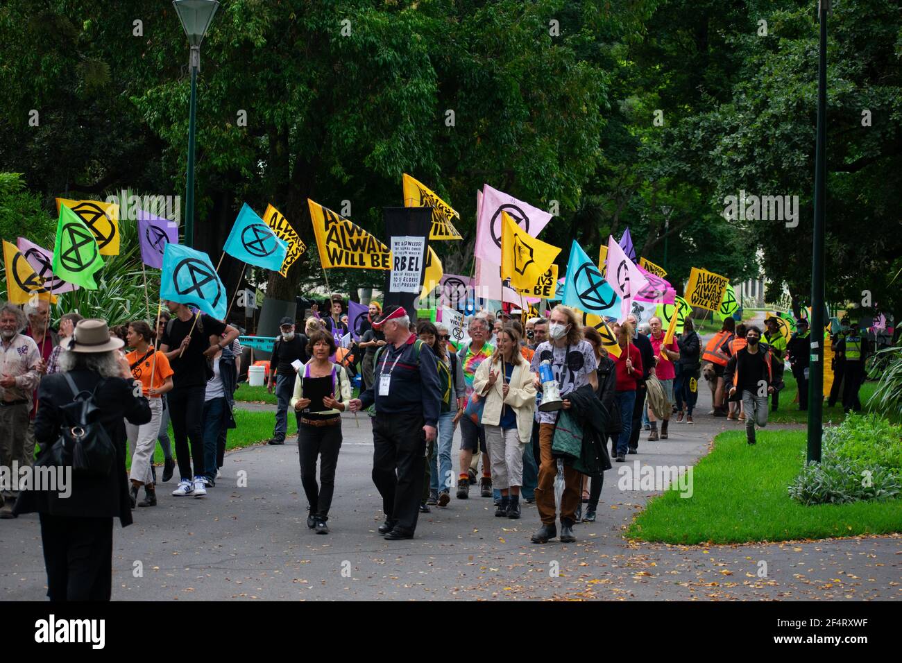 Melbourne, Australia. 23rd March 2021. Extinction Rebellion protesters gather in Carlton Gardens before marching through the city as they attempt to raise public awareness on the issue of climate change inaction. Credit: Jay Kogler/Alamy Live News Stock Photo