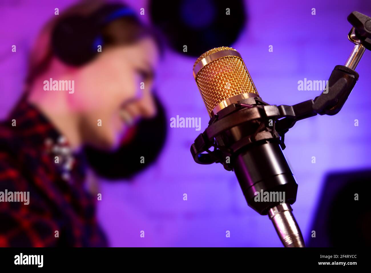 podcaster radio host working in studio. microphone closeup Stock Photo