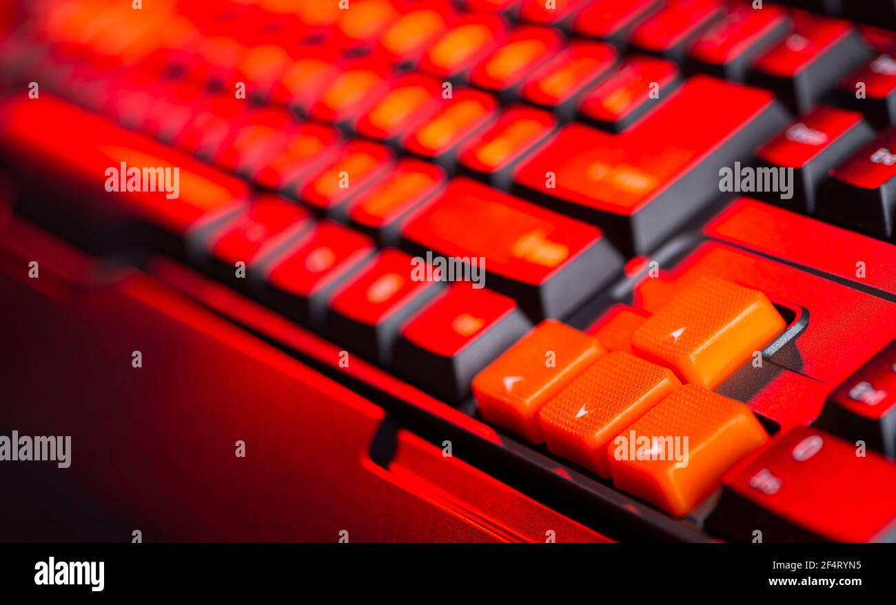Gaming keyboard from computer close-up with color backlight. Stock Photo