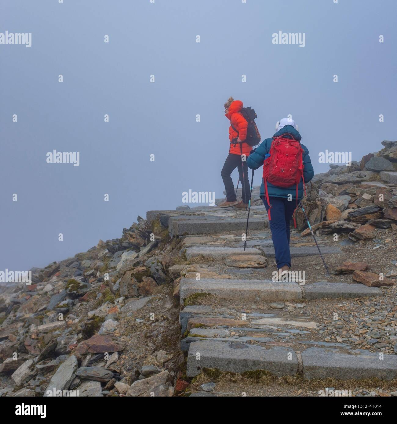 Hikers at the summit of Snowdon in North Wales, UK Stock Photo