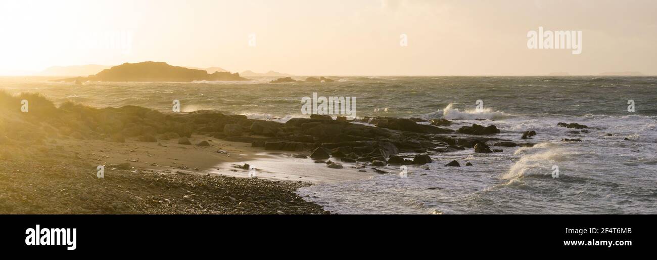 Sunset seascape and wind at Port-Blanc in Brittany, France Stock Photo