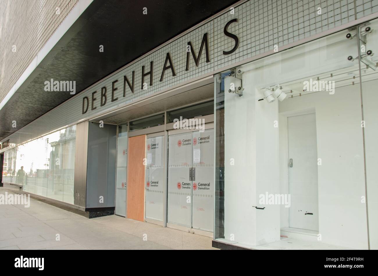London, UK - February 26, 2021:  Boarded up entrance to the former flagship branch of the Debenhams department store in London's Oxford Street.  The s Stock Photo