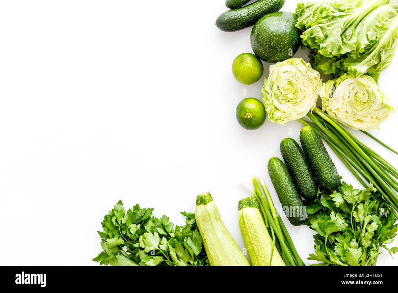 Layout of raw green vegetables, top view Stock Photo - Alamy