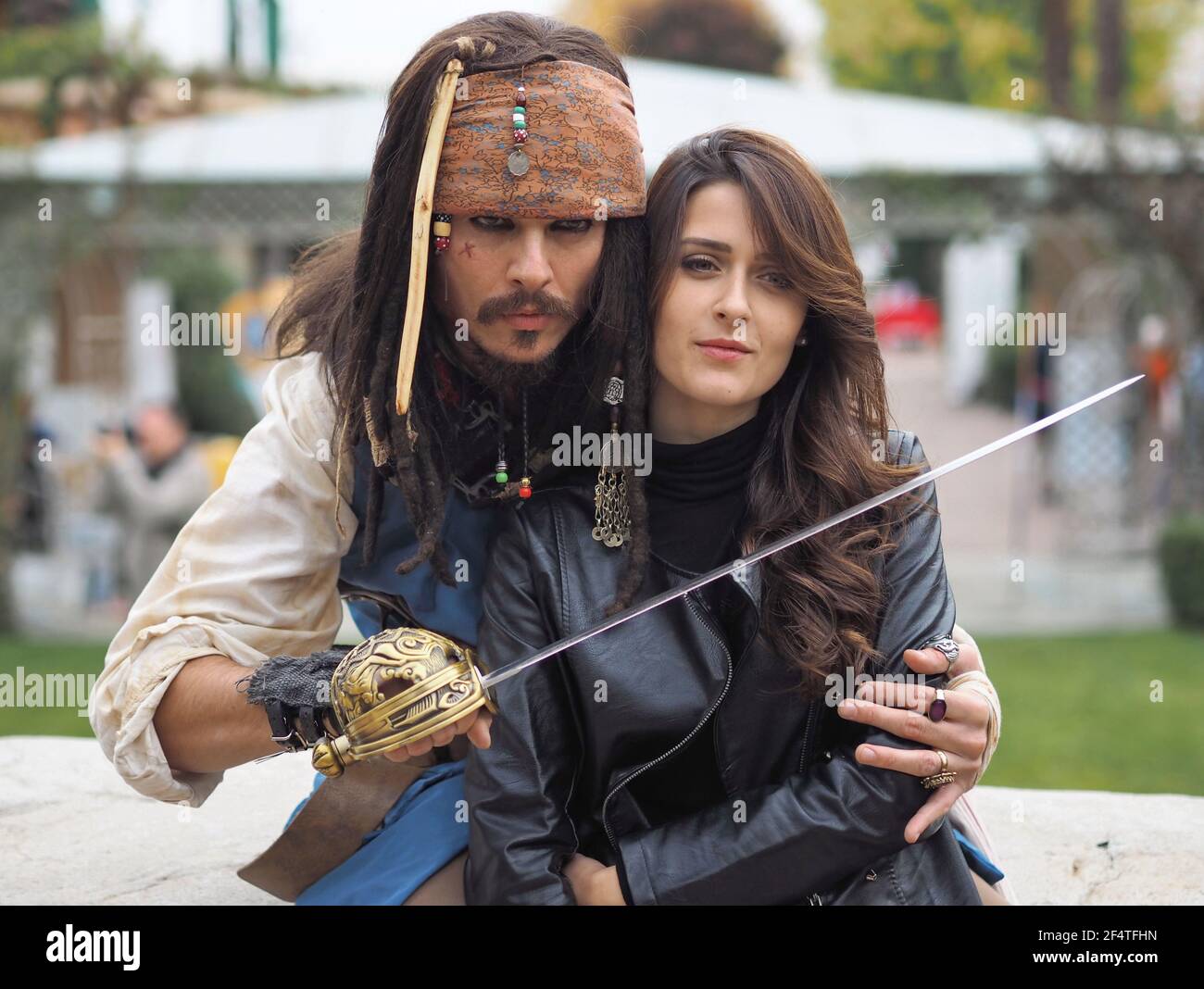 Actors posing for photographers in person cosplay 'Captain Jack Sparrow' from Pirates of the Caribbean Stock Photo