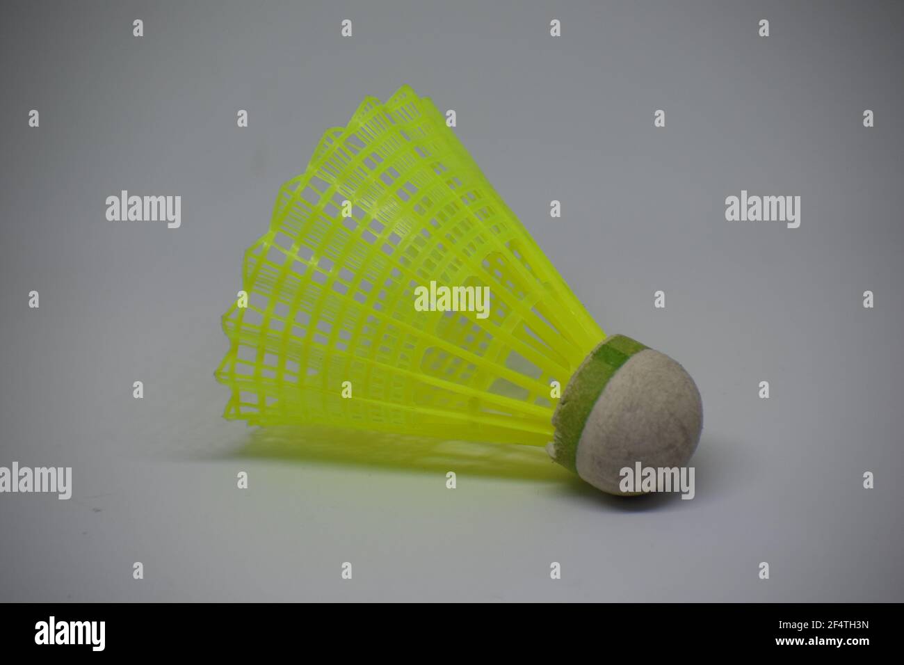 Yellow plastic shuttlecock for badminton Stock Photo