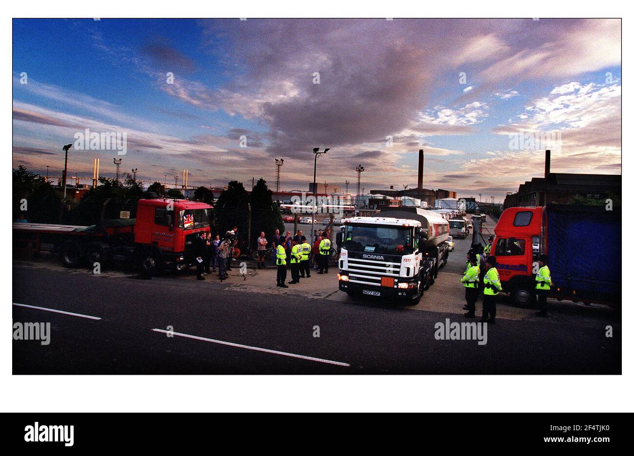 Tankers leave the Esso Depo in Purfleet, Essex September 2000 marked Government Designated Site Delivery Stock Photo