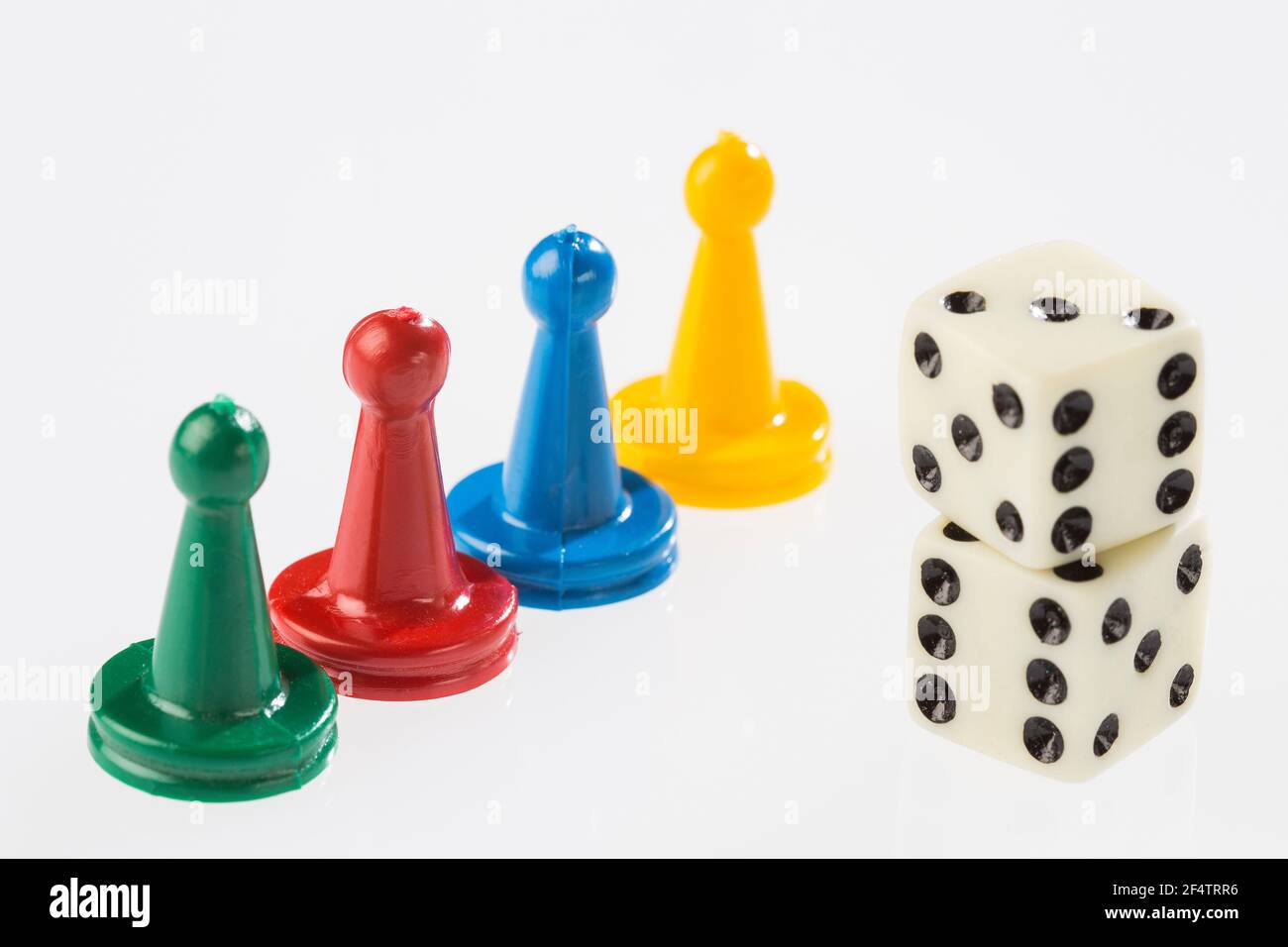 game pieces with dice isolated on white background Stock Photo