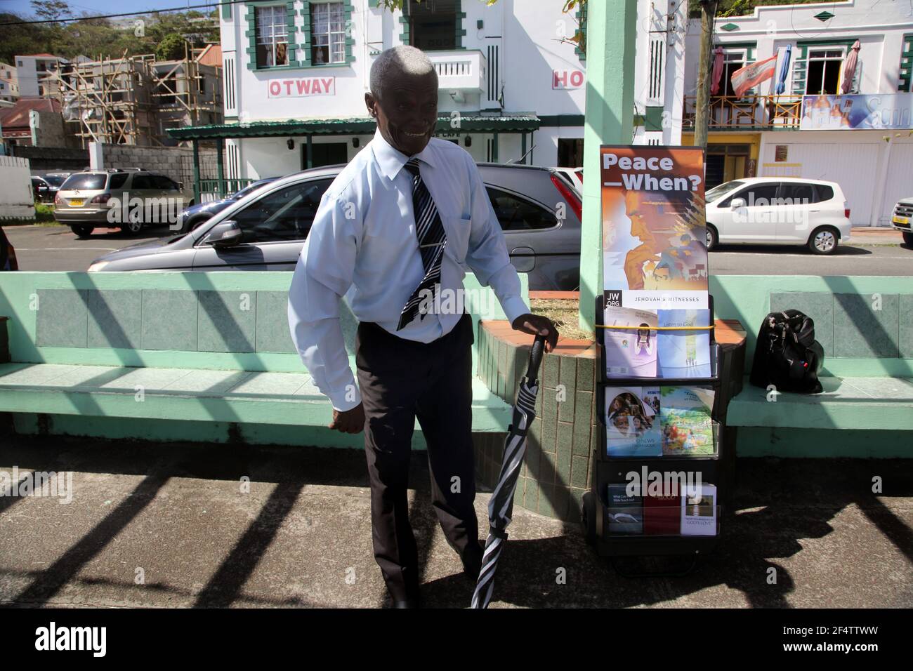 St George's Grenada The Carenage Jehovah witness With Leaflets on Street Stock Photo