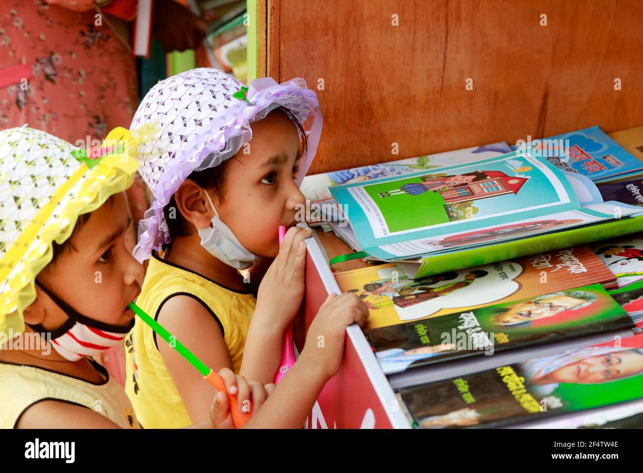 Dhaka, Bangladesh - March 23, 2021: Bangladeshi Visitors browse books