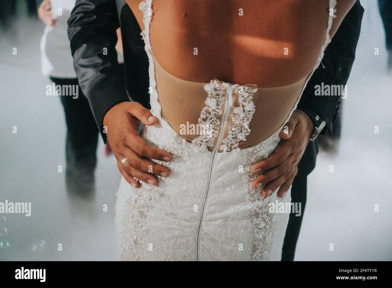 Shallow focus of a bride and groom dancing Stock Photo - Alamy