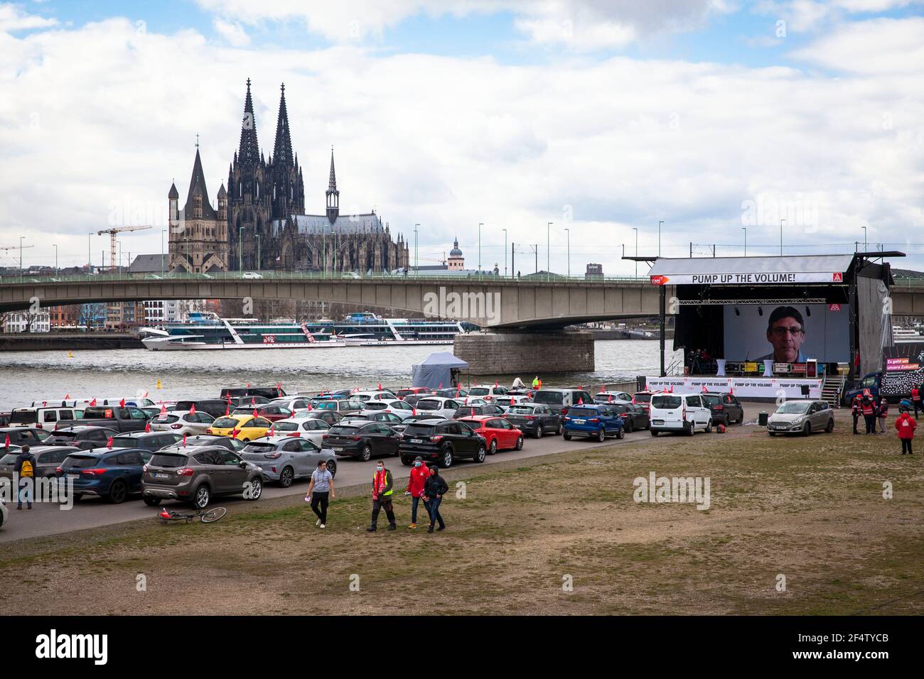IG Metall (Industrial Union of Metalworkers) warning strike rally on March 17, 2021 on the banks of the Rhine in the Deutz district, participants stay Stock Photo