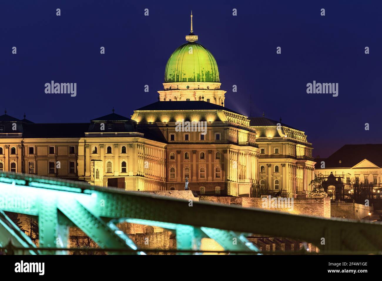 Unique view about the Buda royal castle in Budapest Hungary. Amazing evening photo vith illuminated building. Stock Photo