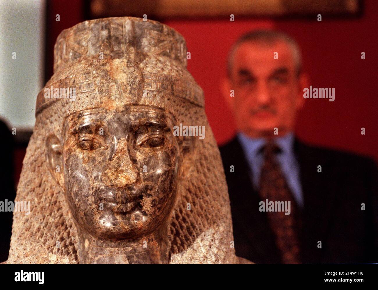 The sculpted head of an Egyptian queen January 2000(thought to be Nefertari) - the so-called Head of Meryet, which was smuggled out of Egypt in the early 1990's, was today returned to the Egyptian government by handing it over to the Egyptian ambassador Mr Adel El-Gazzar, by Dr Robert Anderson, the director of the British Museum.  The picture shows Mr El-Gazzar, with the head at the British Museum. Stock Photo