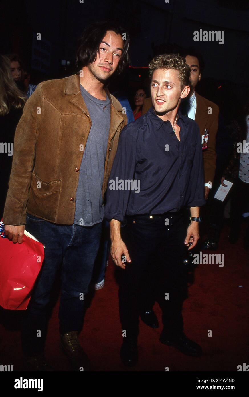 HOLLYWOOD, CA - JULY 18: Alex Winter and Keanu Reeves attend the premiere of 'Bill and Ted's Bogus Journey' on July 18, 1991 at the Mann Chinese Theater in Hollywood, California Credit: Ralph Dominguez/MediaPunch Stock Photo
