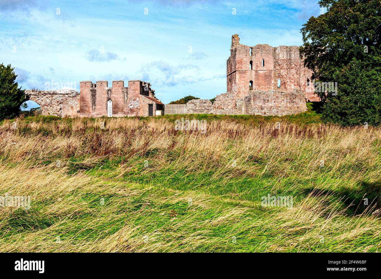 Norham Castle is a Grade I listed building and a Scheduled Ancient Monument. The castle saw much action during the wars between England and Scotland. Stock Photo