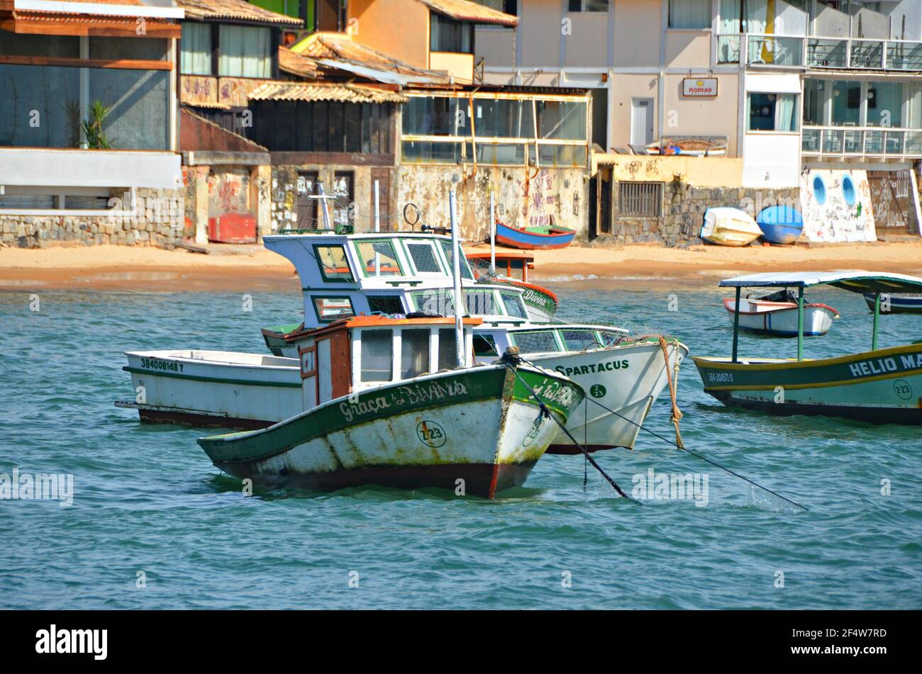 Landscape with view of traditional fishing boats on the waters of Armação dos Búzios, the renown resort town of Rio de Janeiro, Brazil. Stock Photo