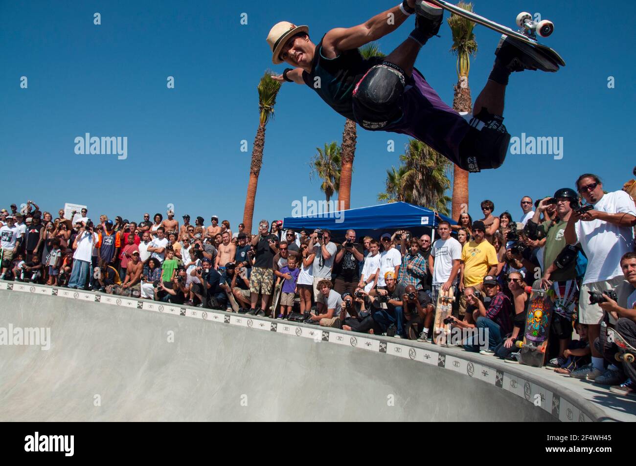 Professional skateboarder Christian Hosoi performs a trick during the