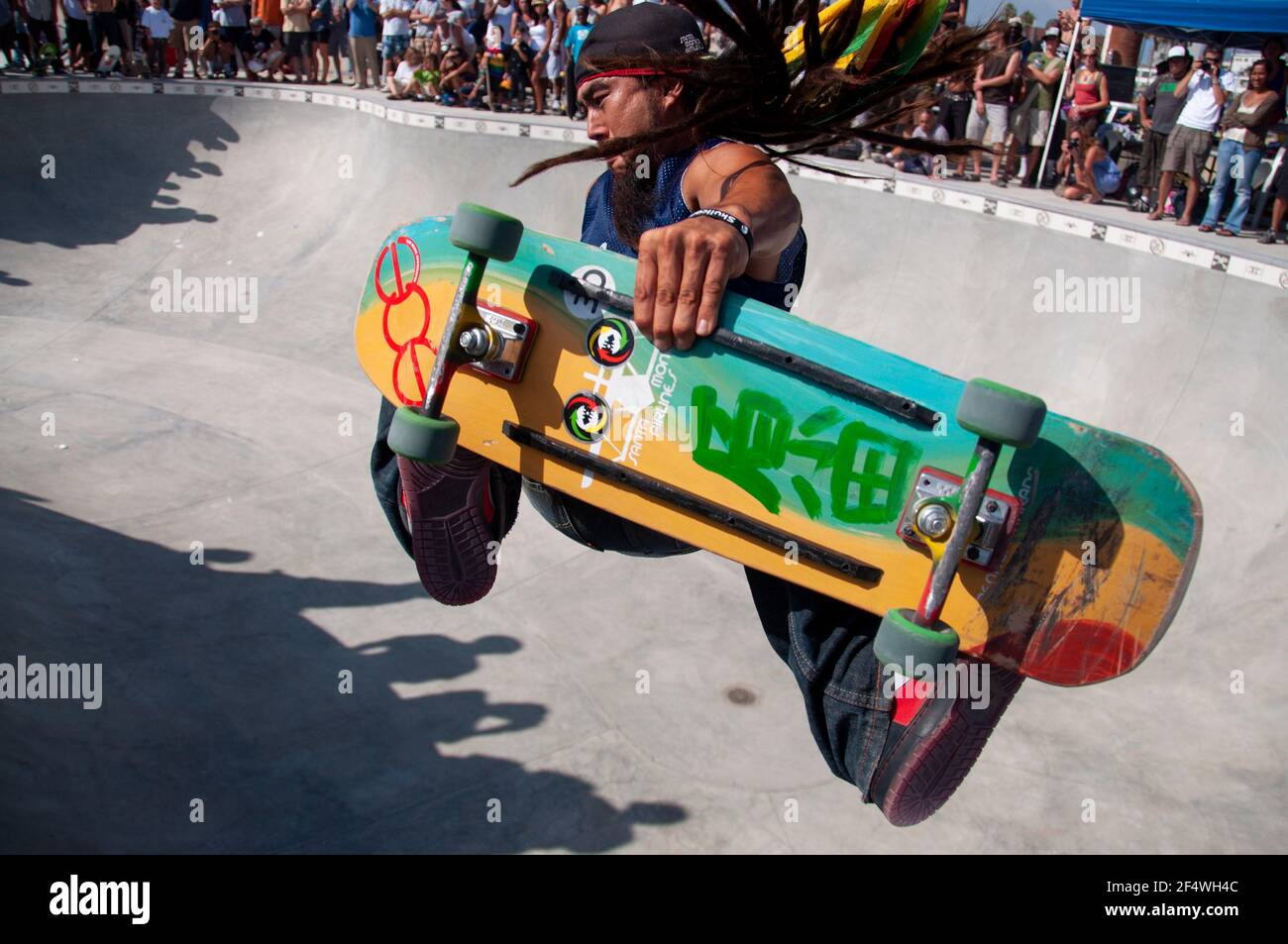 Professional skateboarder Harada performs a trick during the