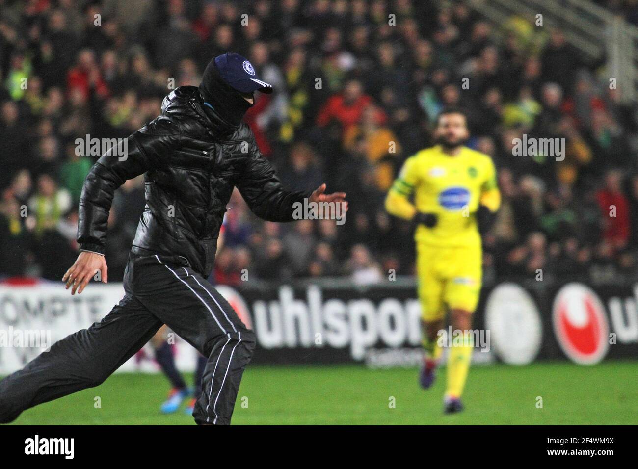 A streaker during the French League Cup football match between Nantes and  Paris Saint-Germain, at the La Beaujoire stadium in Nantes, western France,  on February 4, 2014.. PHOTO/JEAN MARC MOUCHET / DPPI
