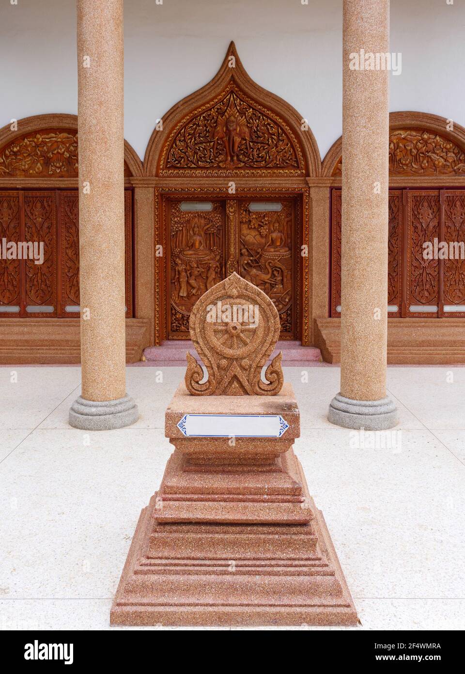 The carved sandstone slab for marking the boundaries of the Thai church, located around the church in the Thai temple, front view with the copy space. Stock Photo