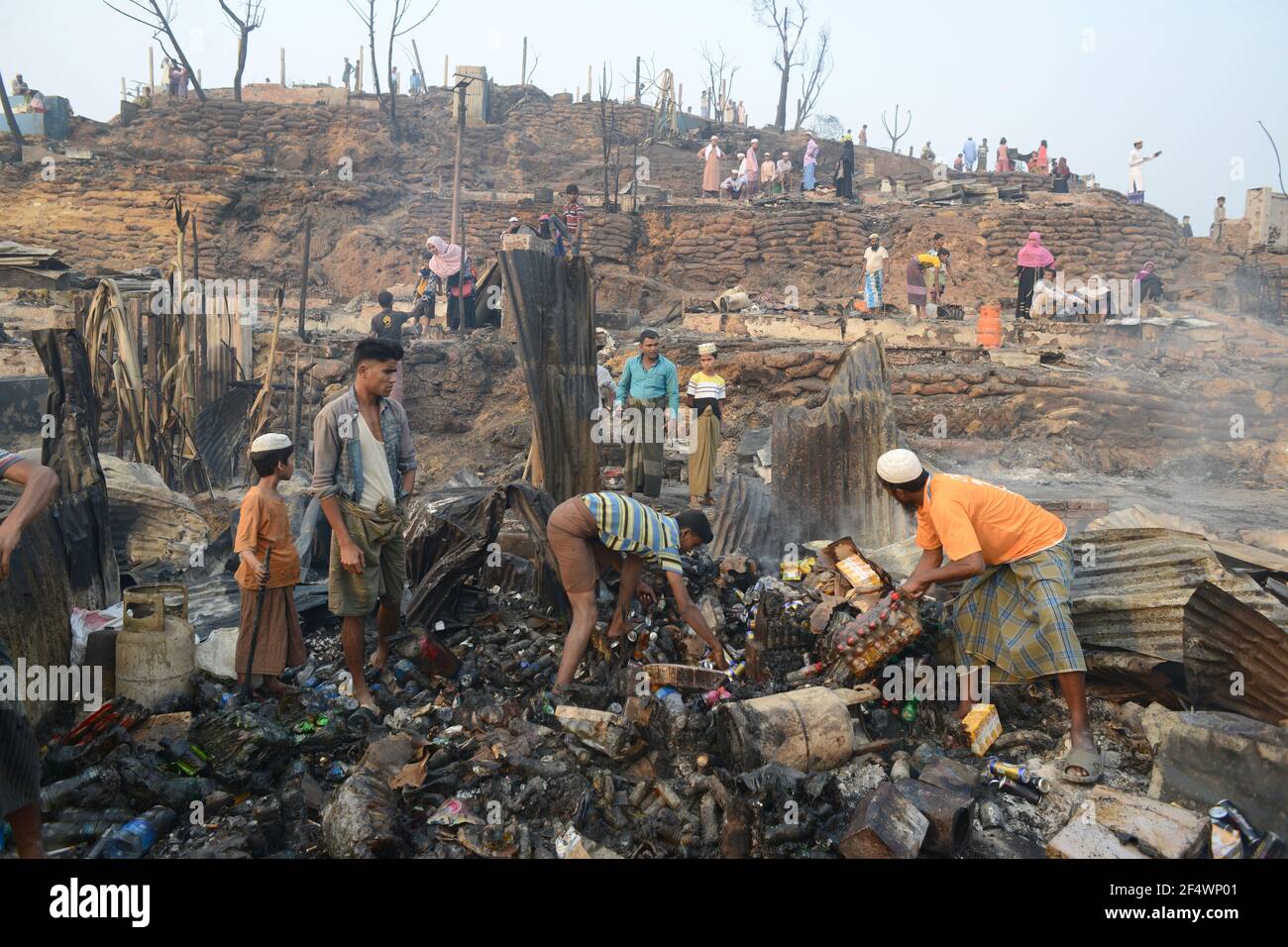 Cox's Bazar, Bangladesh. 23rd Mar, 2021. Massive fire destroys around 10000 homes and 15 killed on Monday March 22 in Rohingya refugee camp at Cox'x Bazar, Bangladesh.Credit: Md Zakirul Mazed/Alamy live News Stock Photo