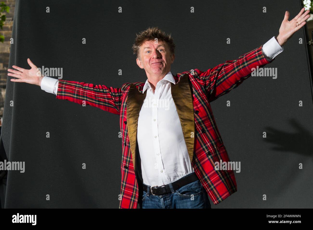 Edimburgh, Scotland. 19 August, 2018. Scottish poet and stand-up comedian Elvis Mcgonagal attends a photocall during the Edinburgh International Book Stock Photo