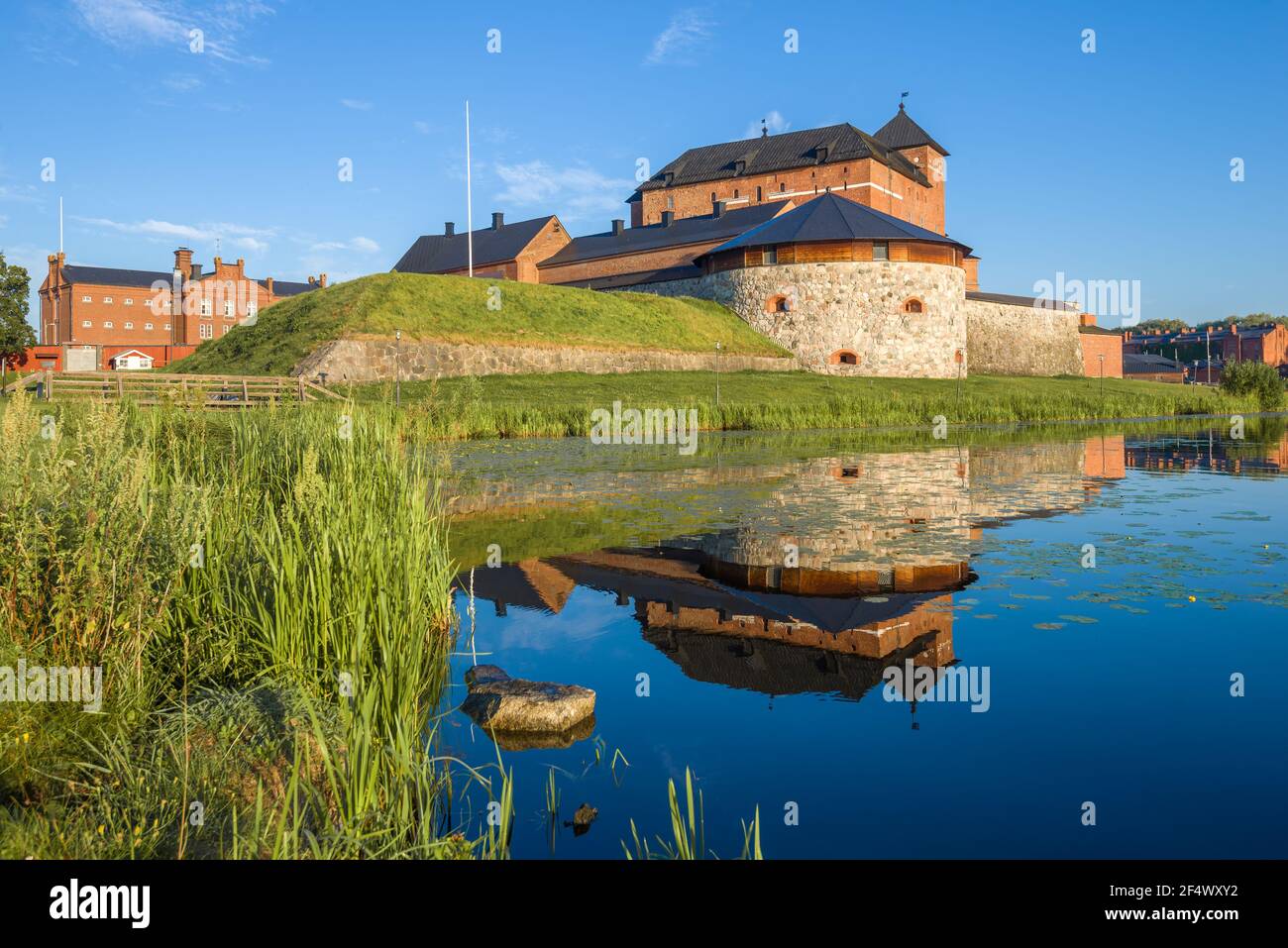 View of the ancient fortress-prison of the Hameenlinna city on a sunny July morning. Finland Stock Photo