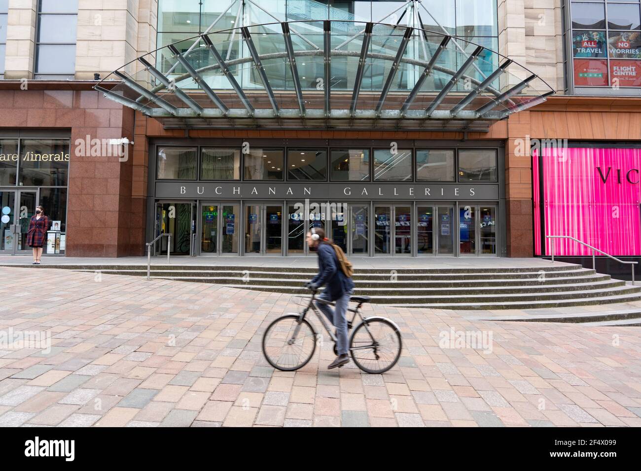 Glasgow, Scotland, UK. 23 March 2021. On the first anniversary of the coronavirus pandemic lockdown the streets in Glasgow city centre are still quiet with only essential shops open. Pic; Buchanan Street is very quiet. Iain Masterton/Alamy Live News Stock Photo