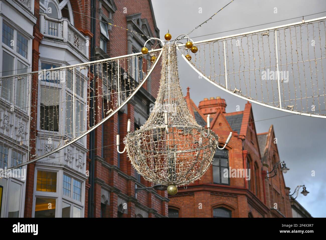Victorian style buildings facade and Christmas lights decorations on Grafton street, Dublin City