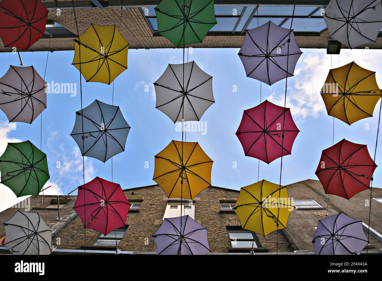 Colorful hanging umbrellas in Anne's Lane, Dublin Ireland Stock Photo