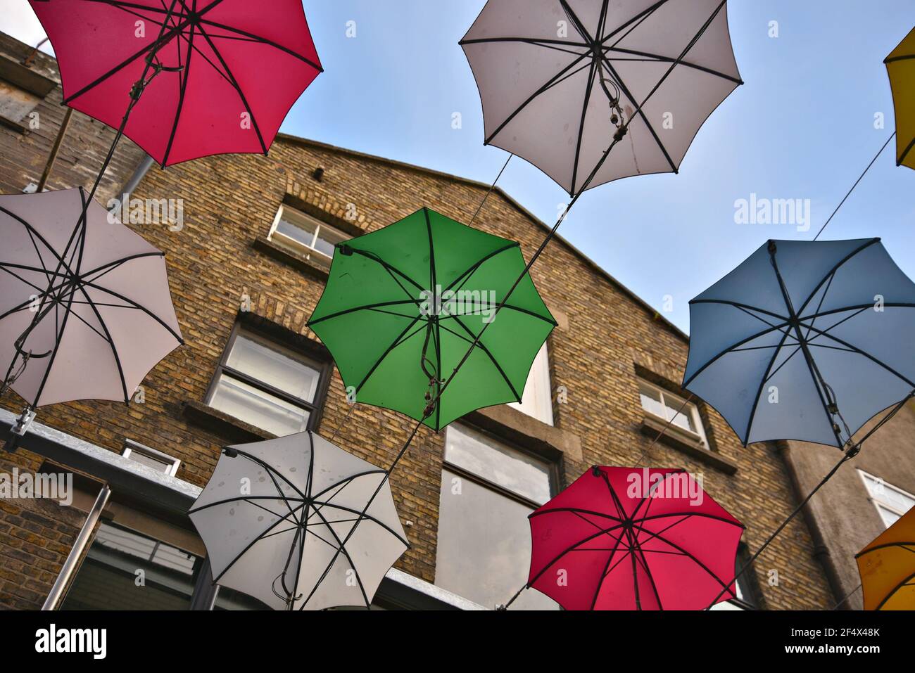 Colorful hanging umbrellas in Anne's Lane, Dublin Ireland Stock Photo