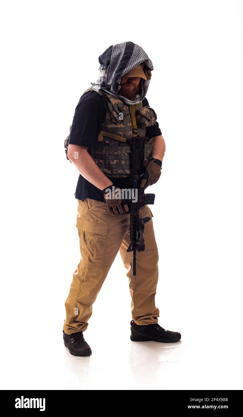 tempo Uluru Wild man in military outfit of the CIA, which is similar to the clothing of a  warrior Mujahedin, in modern times on a white background in studio Stock  Photo - Alamy