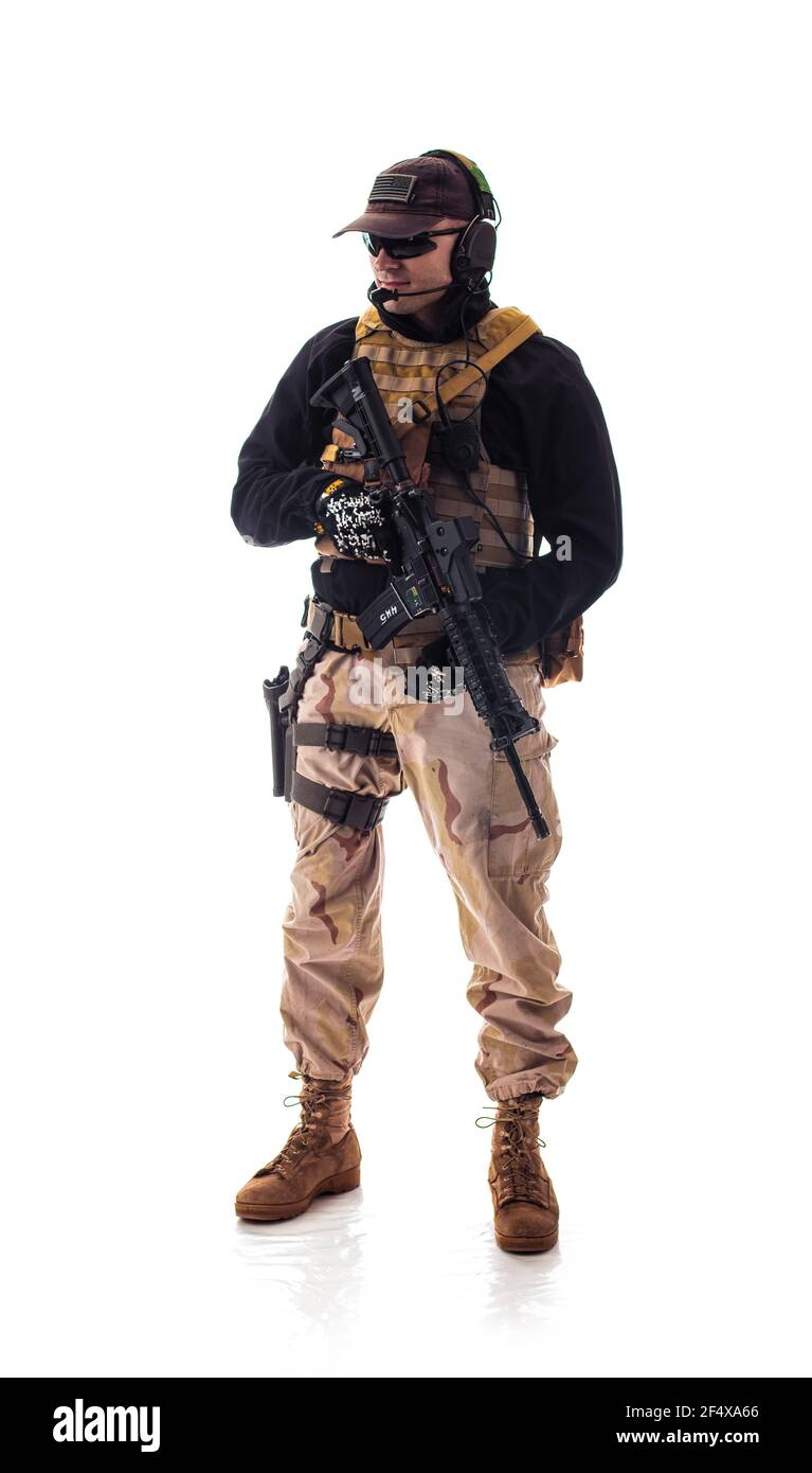 man in military outfit special forces in modern times on a white background in studio Stock Photo
