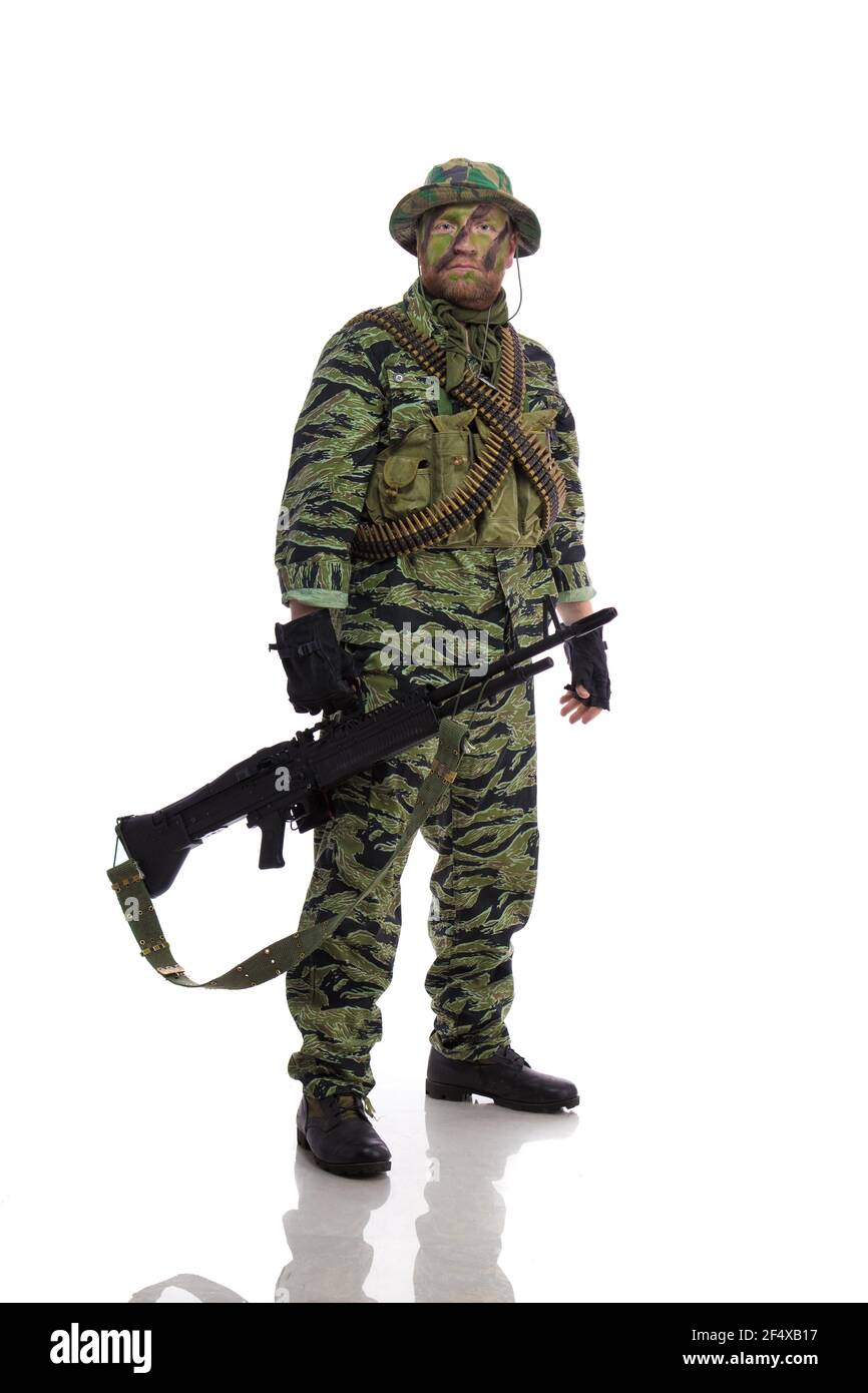 Man actor in the form of an American fur seal posing on a white background. Special Forces in Vietnam, 1970's. Stock Photo