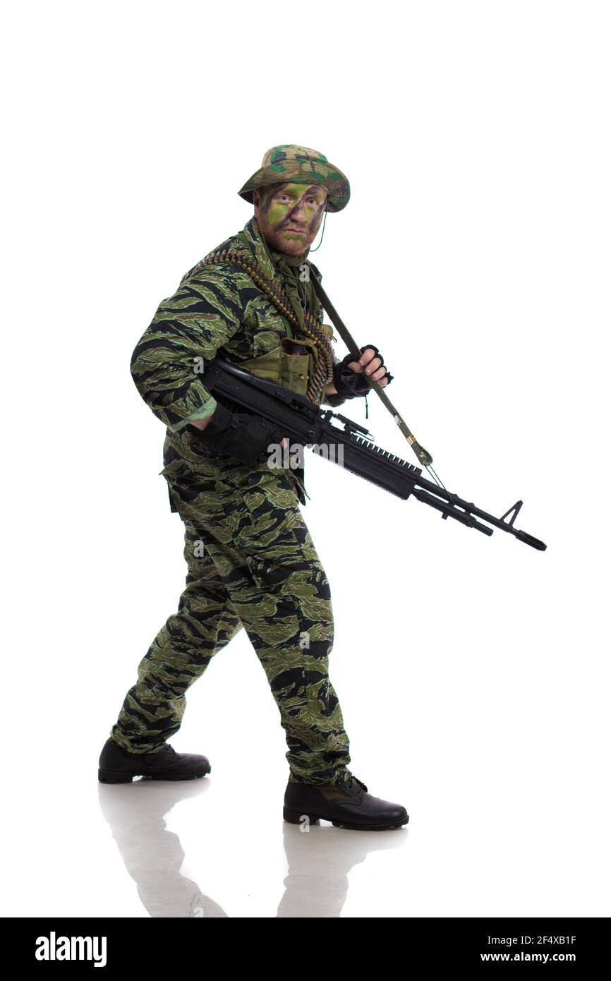Man actor in the form of an American fur seal posing on a white background. Special Forces in Vietnam, 1970's. Stock Photo