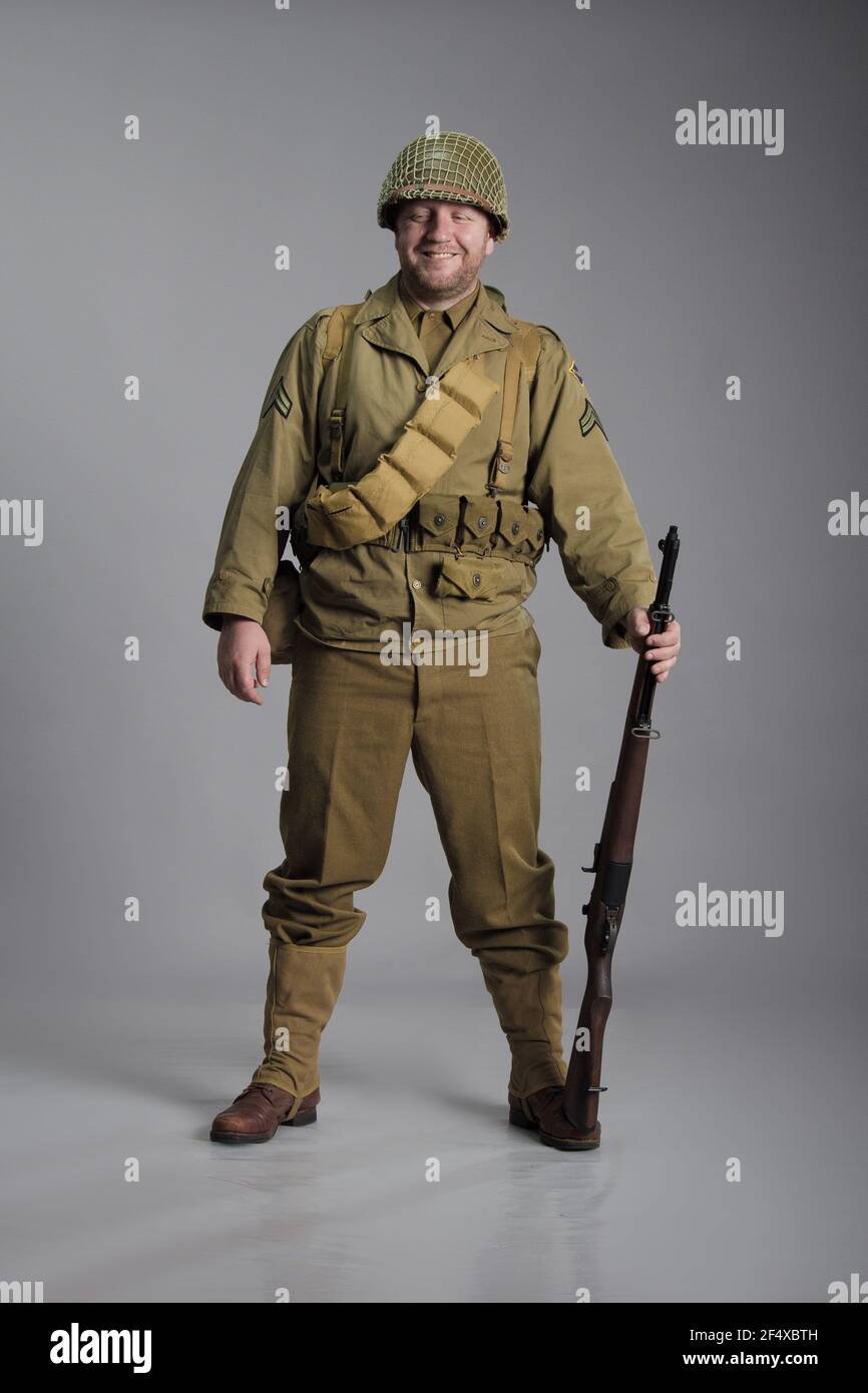 The man is an actor in the military uniform of an American ranger, wearing  a helmet and with a carbine in his hands, the period of the WWII Stock  Photo - Alamy