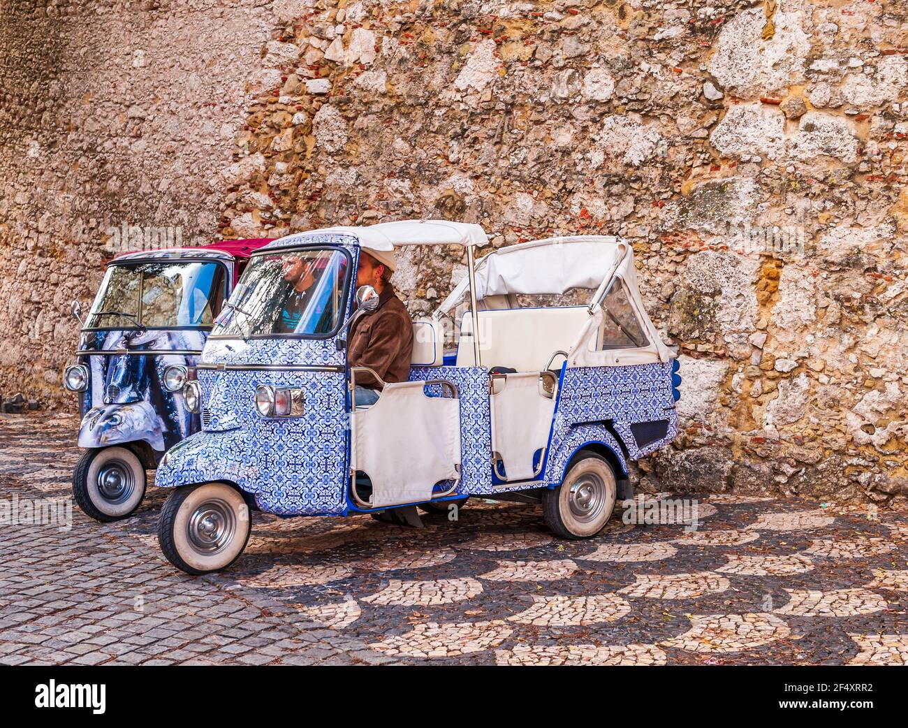 The tuk-tuk in Lisbon is one of the main means of transport for tourists in Lisbon in Portugal Stock Photo