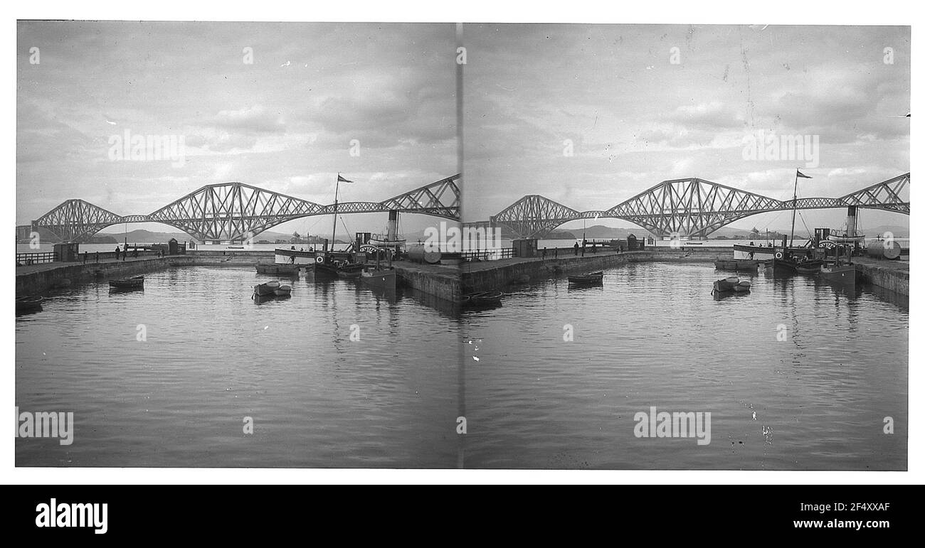 Edinburgh (Great Britain). Railway bridge over the Firth of Forth, in the foreground harbor basin Stock Photo