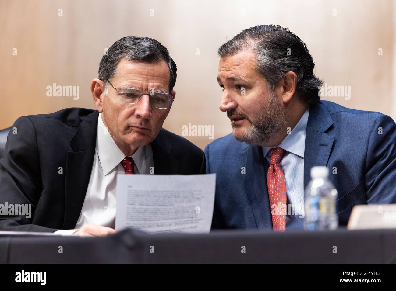 Washington DC, USA. 23rd Mar, 2021. United States Senator Ted Cruz (Republican of Texas) (R) chats with United States Senator John Barrasso (Republican of Wyoming) (L) as they question former US Ambassador to the United Nations Samantha Power (not pictured) as she testifies before the Senate Foreign Relations Committee to be the next Administrator of the United States Agency for International Development (USAID) in the Dirksen Senate Office Building in Washington DC, USA, 23 March 2021.Credit: Jim LoScalzo/Pool via CNP | usage worldwide Credit: dpa/Alamy Live News Stock Photo
