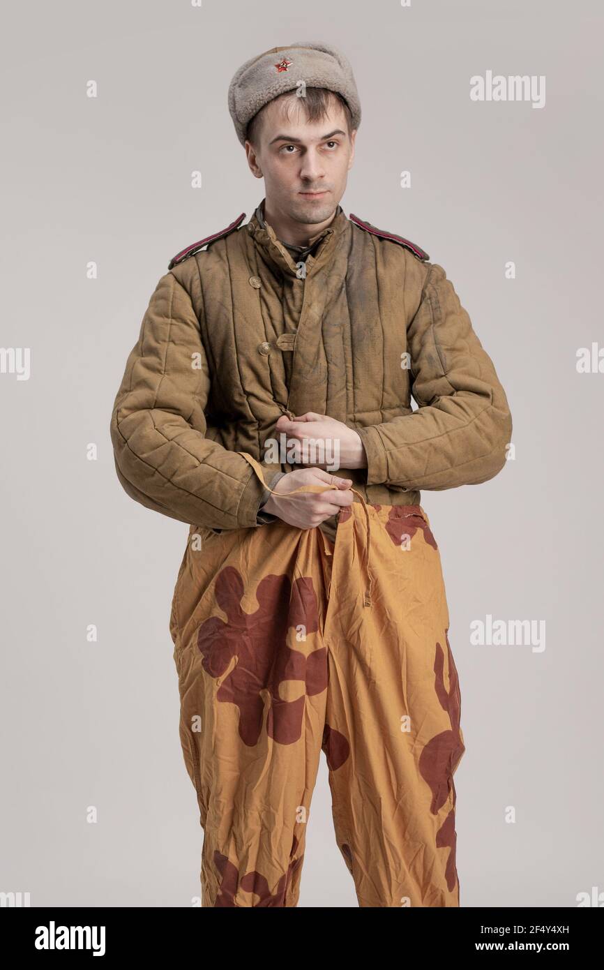 Actor man in an old military uniform and camouflage clothing summer  camouflage robe of a soldier of the Soviet army during the World War II  Stock Photo - Alamy