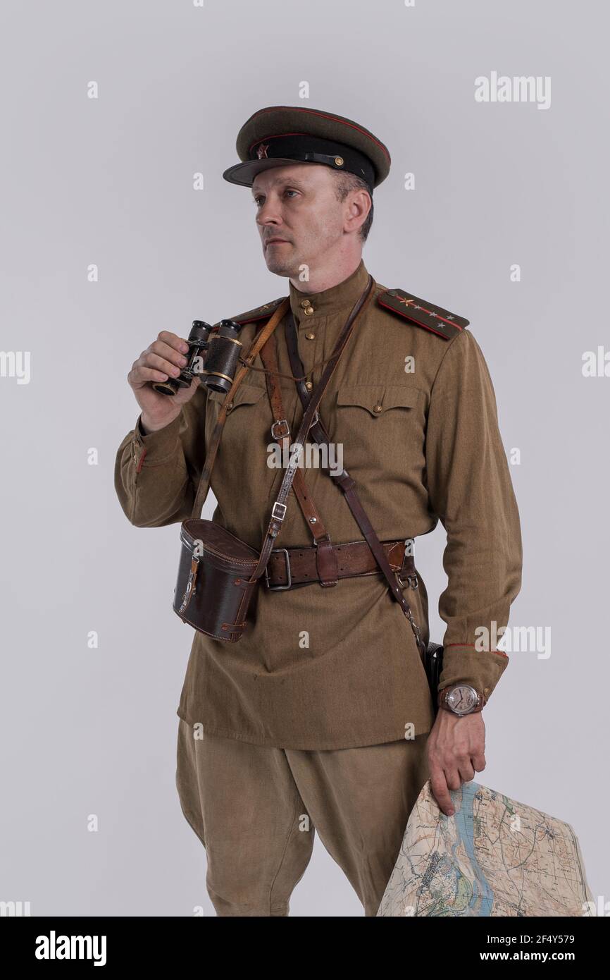 Male actor in the uniform of a Soviet Army officer during World War II with  binoculars in his hands Stock Photo - Alamy