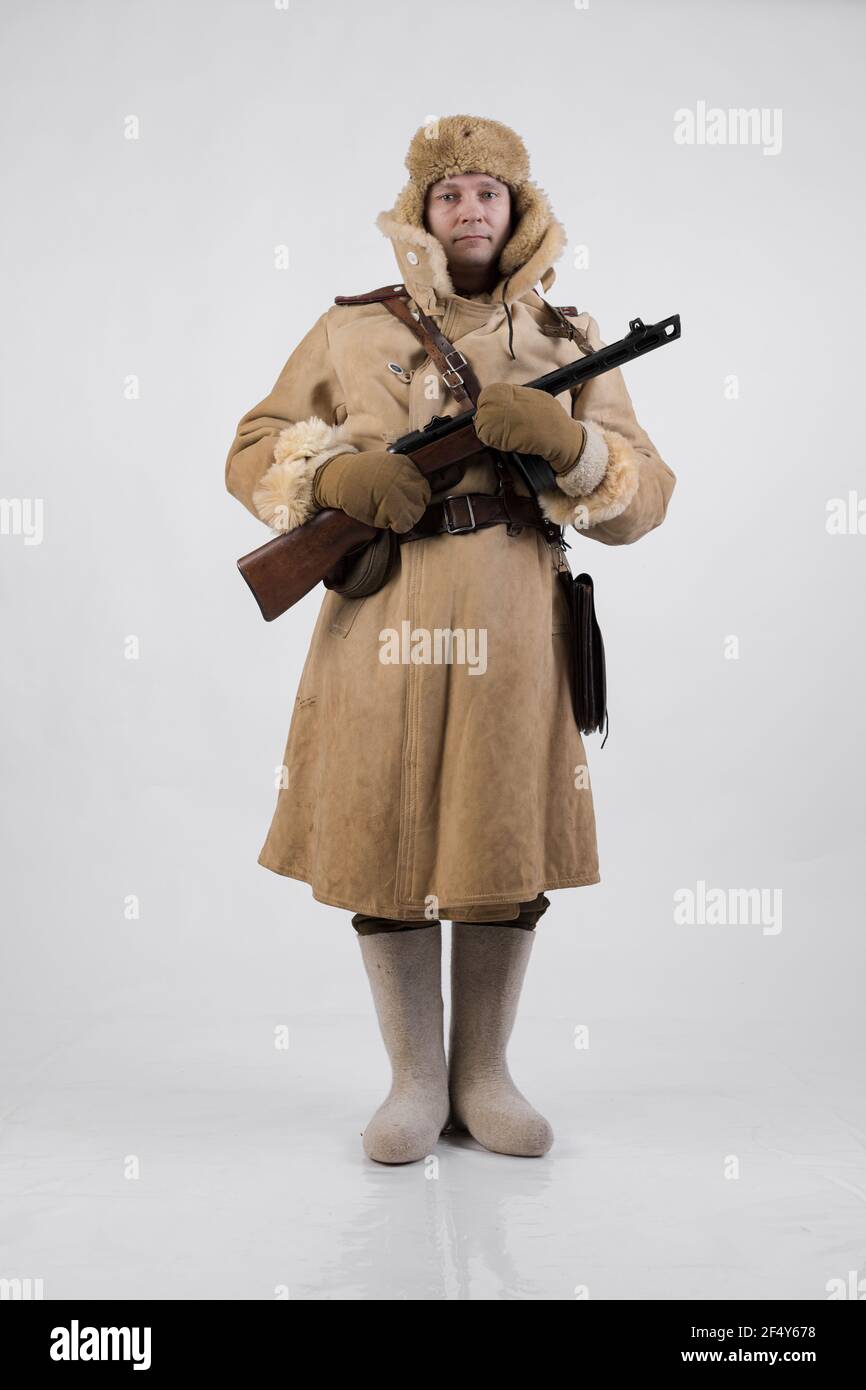 A man in a winter military uniform of an officer of the Soviet army ...