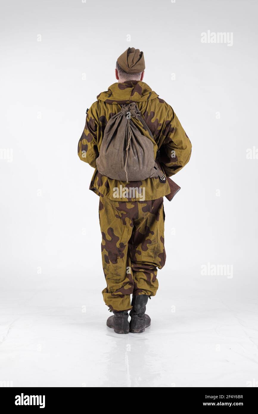 Actor man in an old military uniform and camouflage sniper marksman  clothing of a soldier of the Soviet army during the World War II Stock  Photo - Alamy