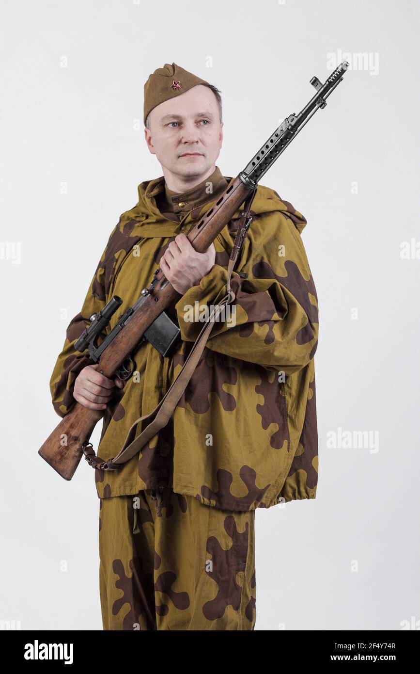 Actor man in an old military uniform and camouflage sniper marksman  clothing of a soldier of the Soviet army during the World War II Stock  Photo - Alamy