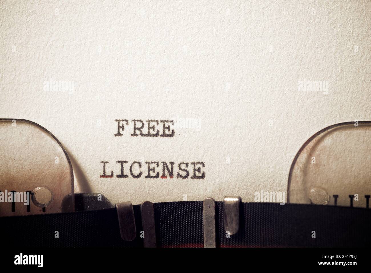 Free license phrase written with a typewriter. Stock Photo