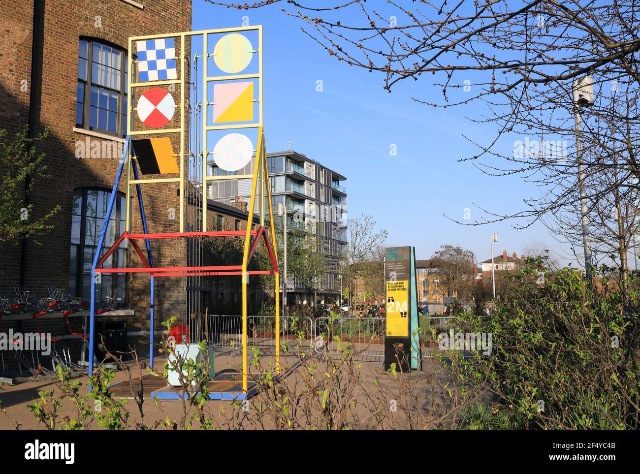 Wharf Road Gardens in early spring sunshine by Granary Square, at Kings