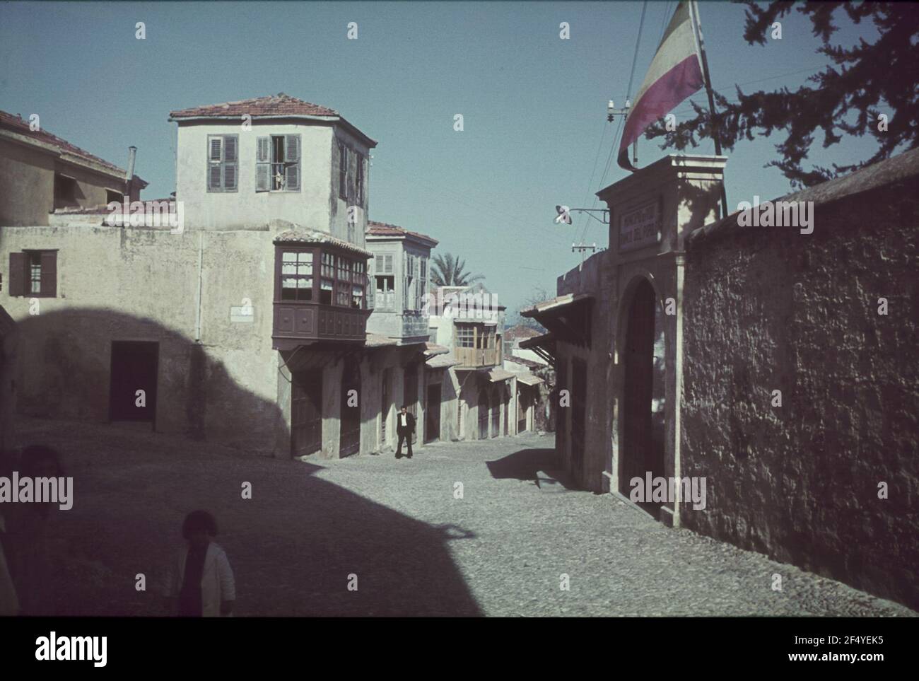 Travel Photos Italy. Street picture with Italian flag Stock Photo