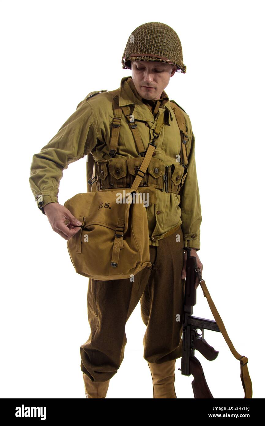 Male actor in military uniform of American ranger of World War II period  posing against white background Stock Photo - Alamy
