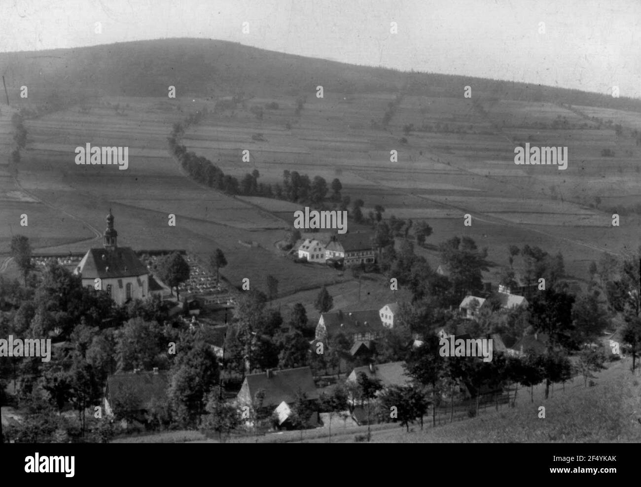 Middle village with church and hiemanndeargood Stock Photo Alamy
