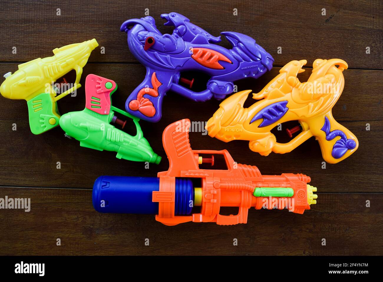 Pichkari, a water gun or toy gun used as props to shoot water and play on the occassion of Indian Holi festival celebrationg. Kids toy guns pinchkari Stock Photo